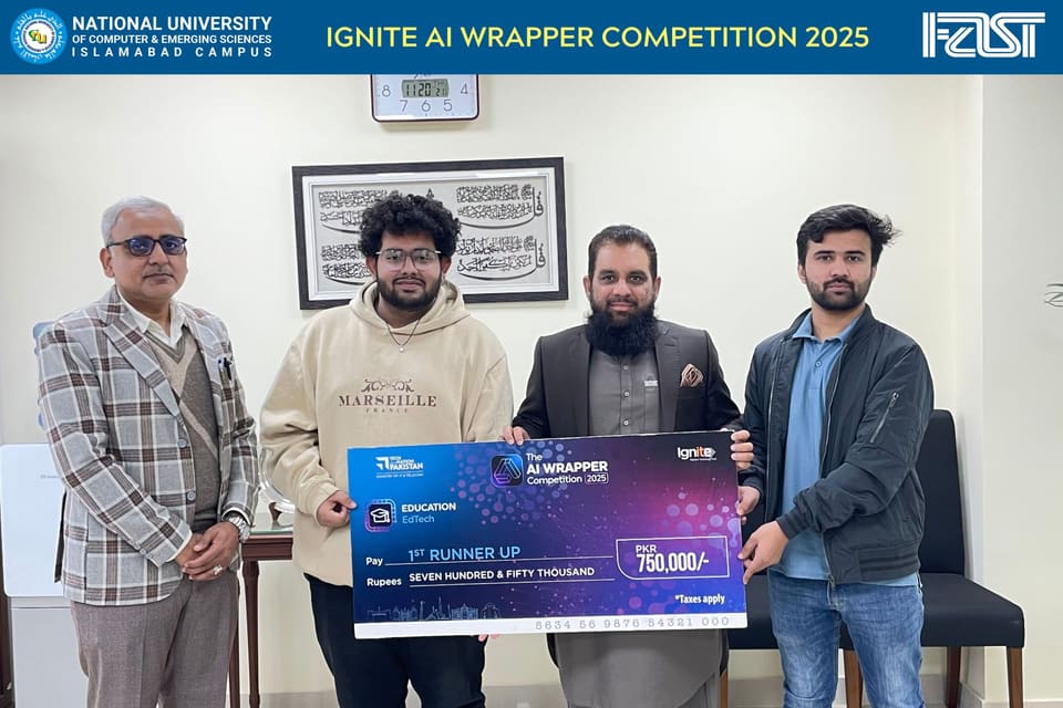 Ignite AI Wrapper Competition 2025 at FAST NUCES Islamabad: Abdullah and Saffi receiving the 1st Runner Up cheque for PKR 750,000